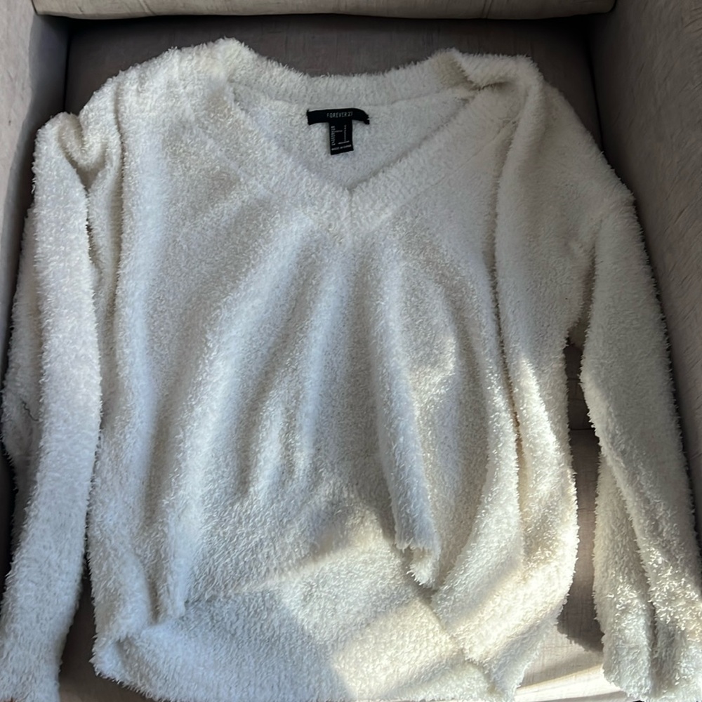 white fluffy sweater